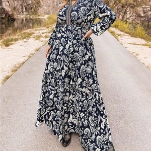 NWT A line floral dress, high waisted with bishop sleeves.